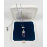 Amethyst set pendant silver colour necklace.