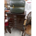 20th century music sheet chest of drawers.