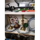Shelf of collectables includes victorian draining bowls.
