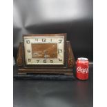 Art deco FHS mantle clock with pendulum.