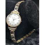 9ct gold cased rotary ladies watch. Needs attention.