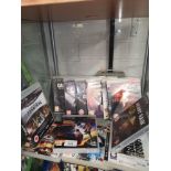 Shelf of PlayStation 3 games.