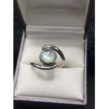Silver moon stone set ring.