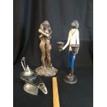 Signed resin large couple figure, bronze style heavy dog candle stick figure together with genie