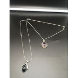 2 silver ornate necklaces set with stone s.