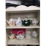 Collection of tea pots.