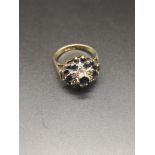 9ct gold diamond and sapphire set ring.