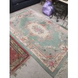 Large Oriental style livingroom rug.