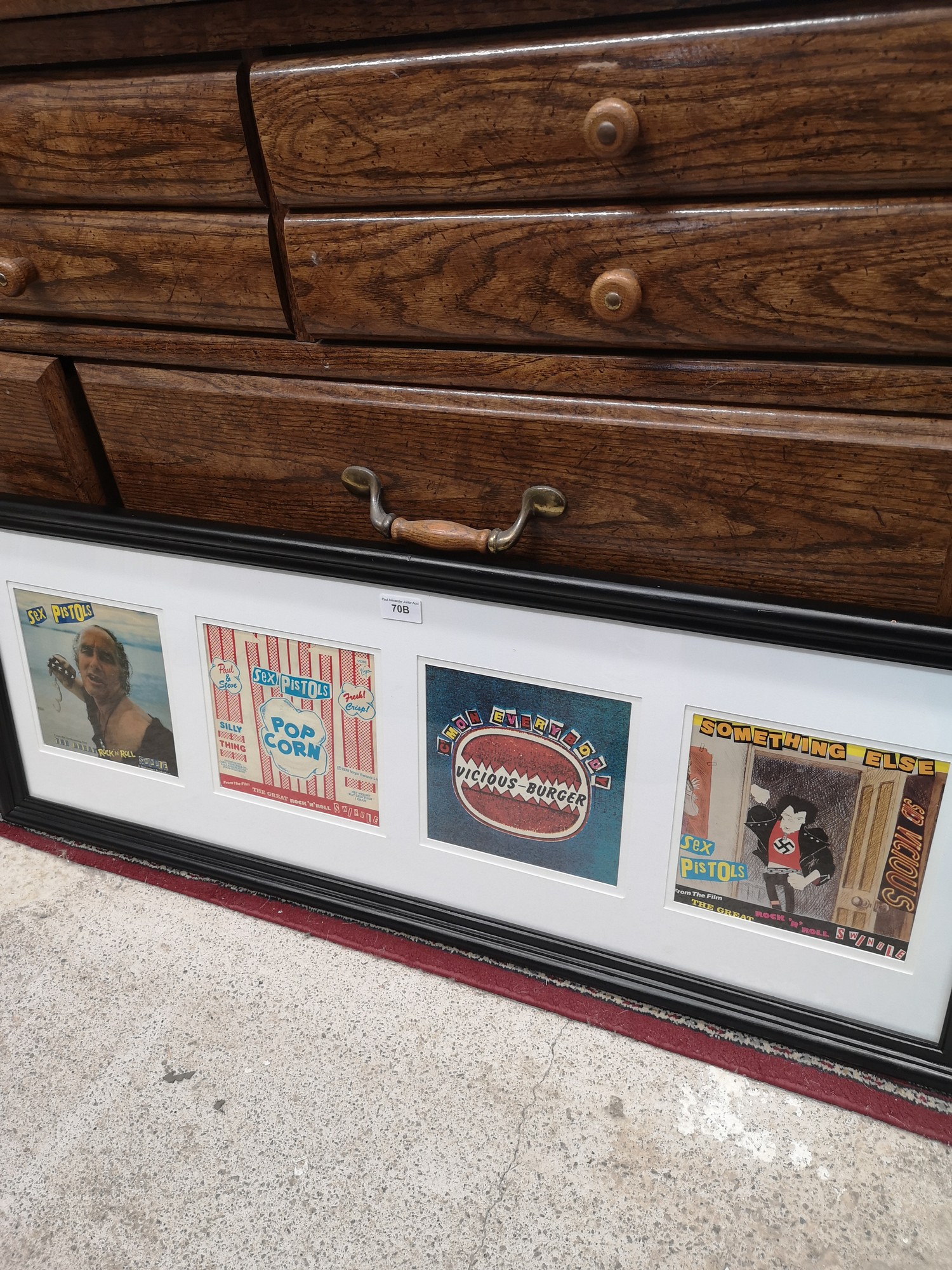 Framed set of 4 sex pistols record In the fitted framing.