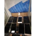 Shelf of Samsung, blackberry mobile phones etc.