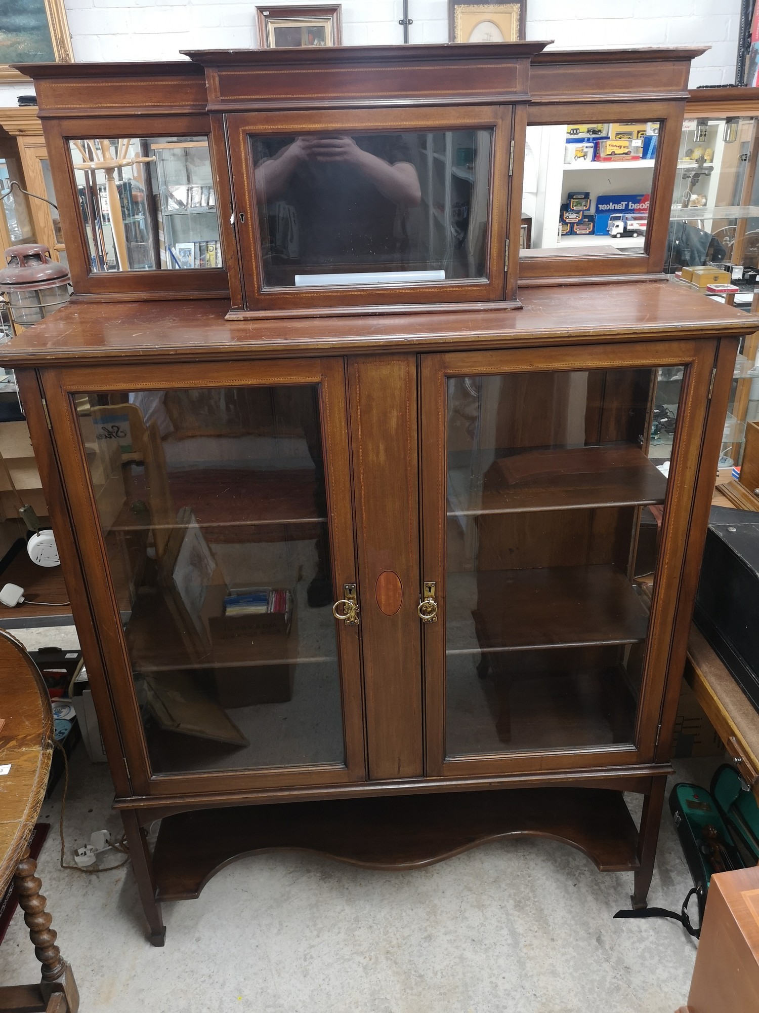 Large Edwardian mirrored topped display cabinet.