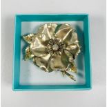 Beautiful large vintage flower design statement brooch with centre aurora borealis stone.