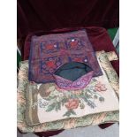 Eastern prayer mat with hat etc.