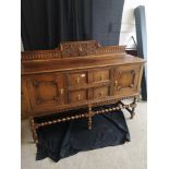 Old charm oak pedistal sideboard.