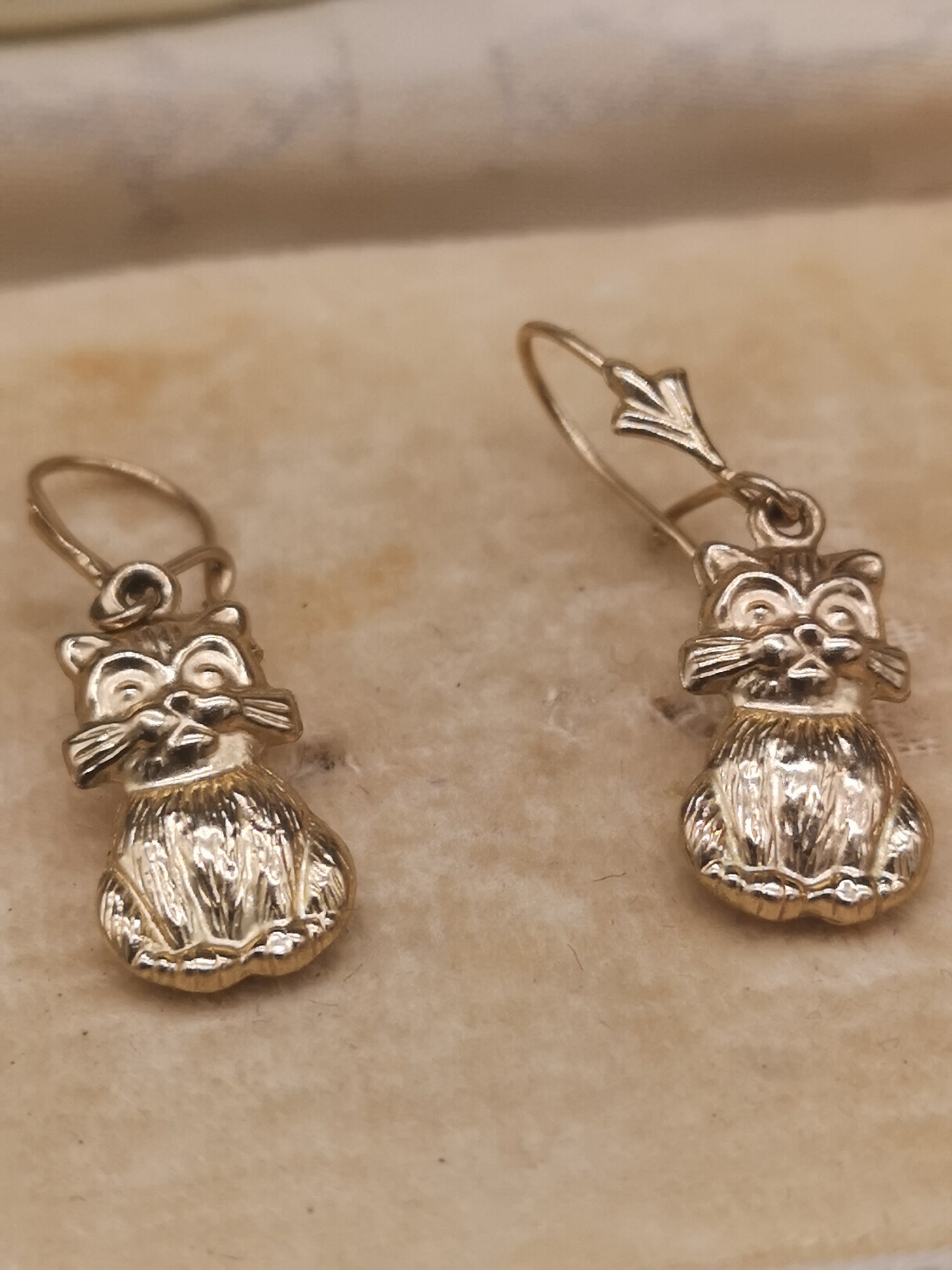 Pair of 9ct gold cat earrings.