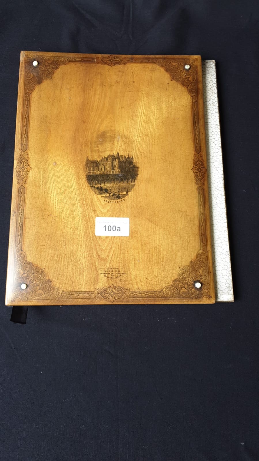 Large mauchline ware book cover with rare mother of pearl studs.