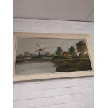 Large oil Painting of windmill signed Carlos framed.