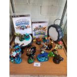 Shelf of PlayStation skylanders with games and ports.