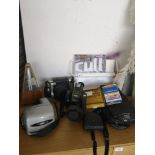 Lot of vintage camera equipment and video camera together with German metronome etc.