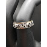 Vintage 9ct gold, silver ring set with heart design with stones. 3 grams.