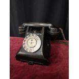 Bakelite telephone with original cords.