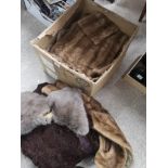 Large box of fur coats.