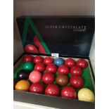 A complete set of Super crystalate snooker balls in original box.