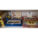 Lot of model shelf of boxed beano and dandy van double sets in good Condition.
