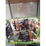 Shelf of xbox 360 games.