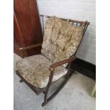 19th century rocking chair with original upholstery.