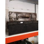 Old wooden tool trunk together with suit case.