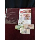 Lot of foreign notes and coins.