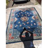 Large woven dragon pattern rug. 86 inches width, by 116 inches in length.
