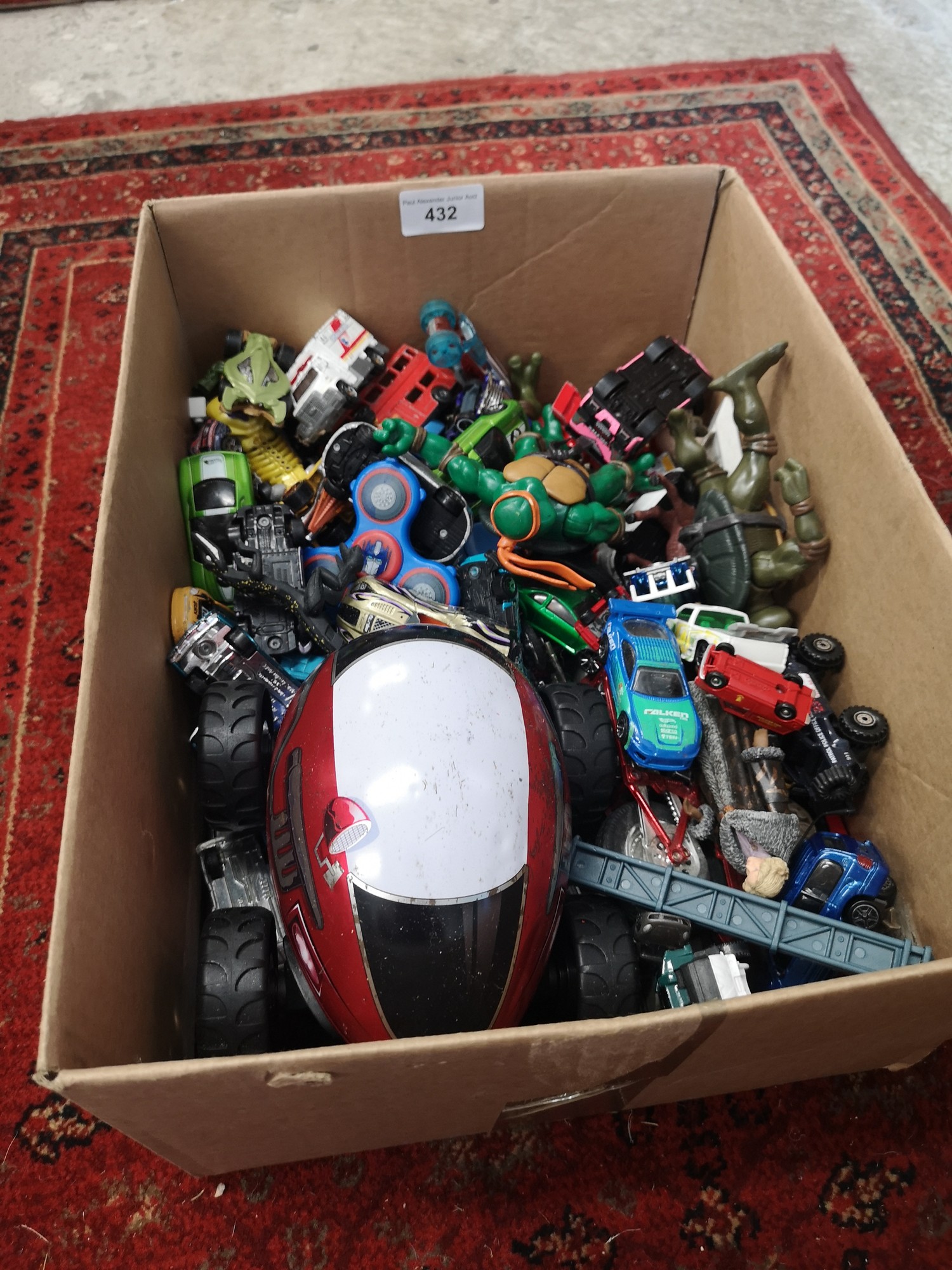 Large box of playworn cars.