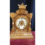 Ansonia of New York light oak mantle clock dated 1882 with pendulum.