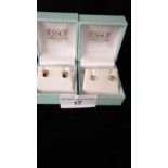 2 Pairs of 9ct gold earrings from jessops .
