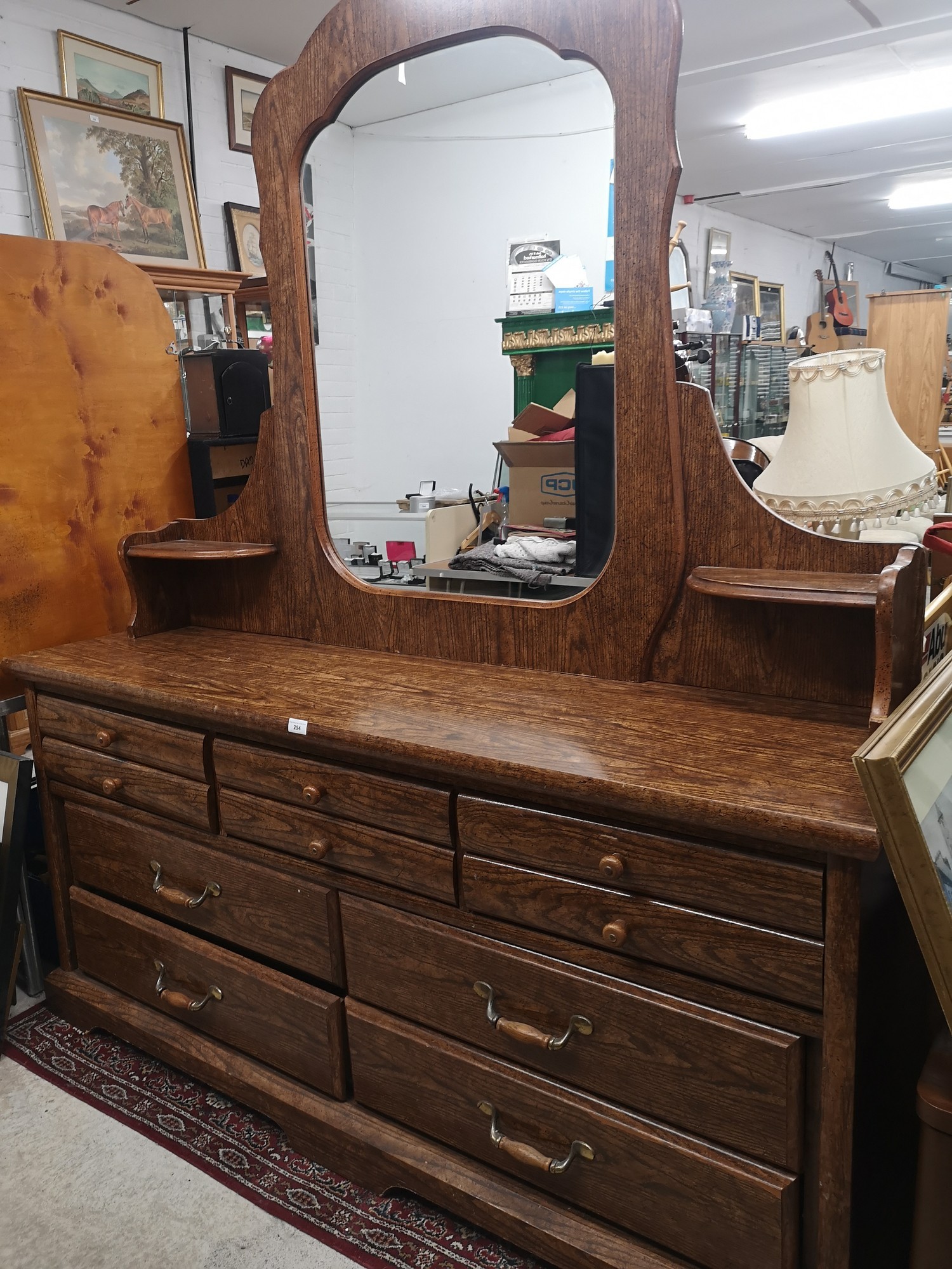 Large vintage mirrored back dresser.