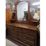 Large vintage mirrored back dresser.