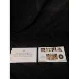 The Queen Elizabeth II longest reigning monarch solid gold coin 1st day cover.