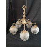 Vintage brass 5 branch ceiling light with shades.