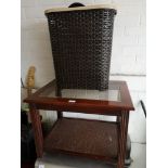 Small occasional table together with linen basket.