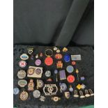 Selection of enamel badges etc .