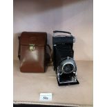 Kodak London bellows camera together with case.