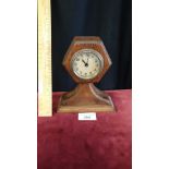 1900s Oak 8 day travel mantle small clock on oak based support.