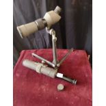 Vintage spotting scope on stand together with old J H Steward limited of London spotting scope.