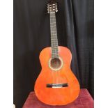 Valencia acoustic guitar.