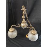 Vintage brass ceiling light with glass shades.