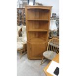 Ercol Blonde Wood corner cabinet.