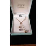 9ct gold 18 inch chain with triple drop pendant. 5.25 grams . from jessops of glenrothes .