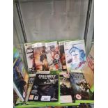 Shelf of xbox 360 games.